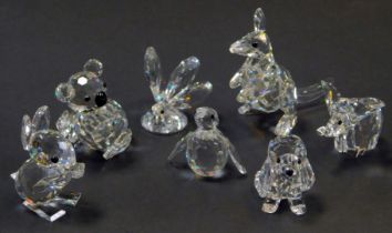 A group of Swarovski crystal figures, comprising kangaroo (AF), butterfly (AF), elephant, penguin,