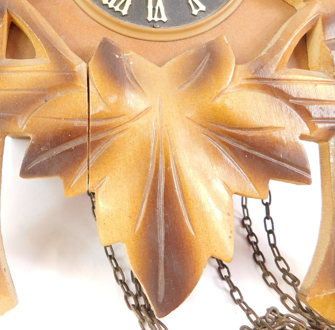 A 20thC pine cased cuckoo clock, with applied maple leaf vines, Regula movement, weights and - Image 3 of 3