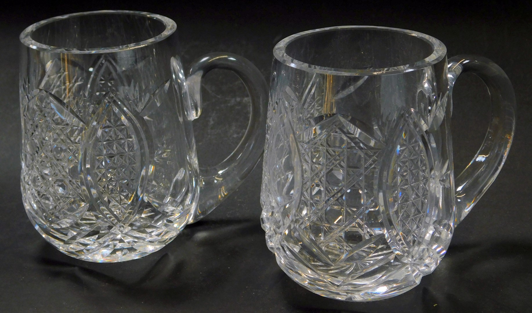 A pair of Waterford crystal tankards, each stamped, 11.5cm high.