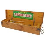 A Jaques croquet set, contained in a pine case.