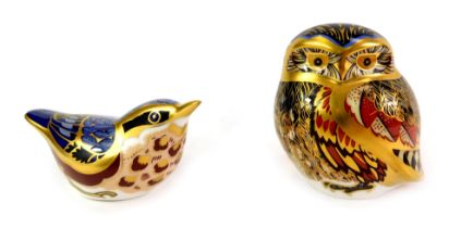 Two Royal Crown Derby porcelain paperweights, modelled as a nuthatch, 5cm high, and owl, 8.5cm high,