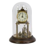 A 20thC brass anniversary clock, the cream circular enamel dial bearing Arabic numerals, barrel
