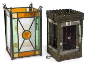 An early 20thC leaded stained glass lantern, of square form, in green, orange and yellow, 30cm high,