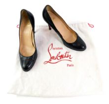 A pair of Christian Louboutin black leather stiletto shoes, size 40, with dust bag.