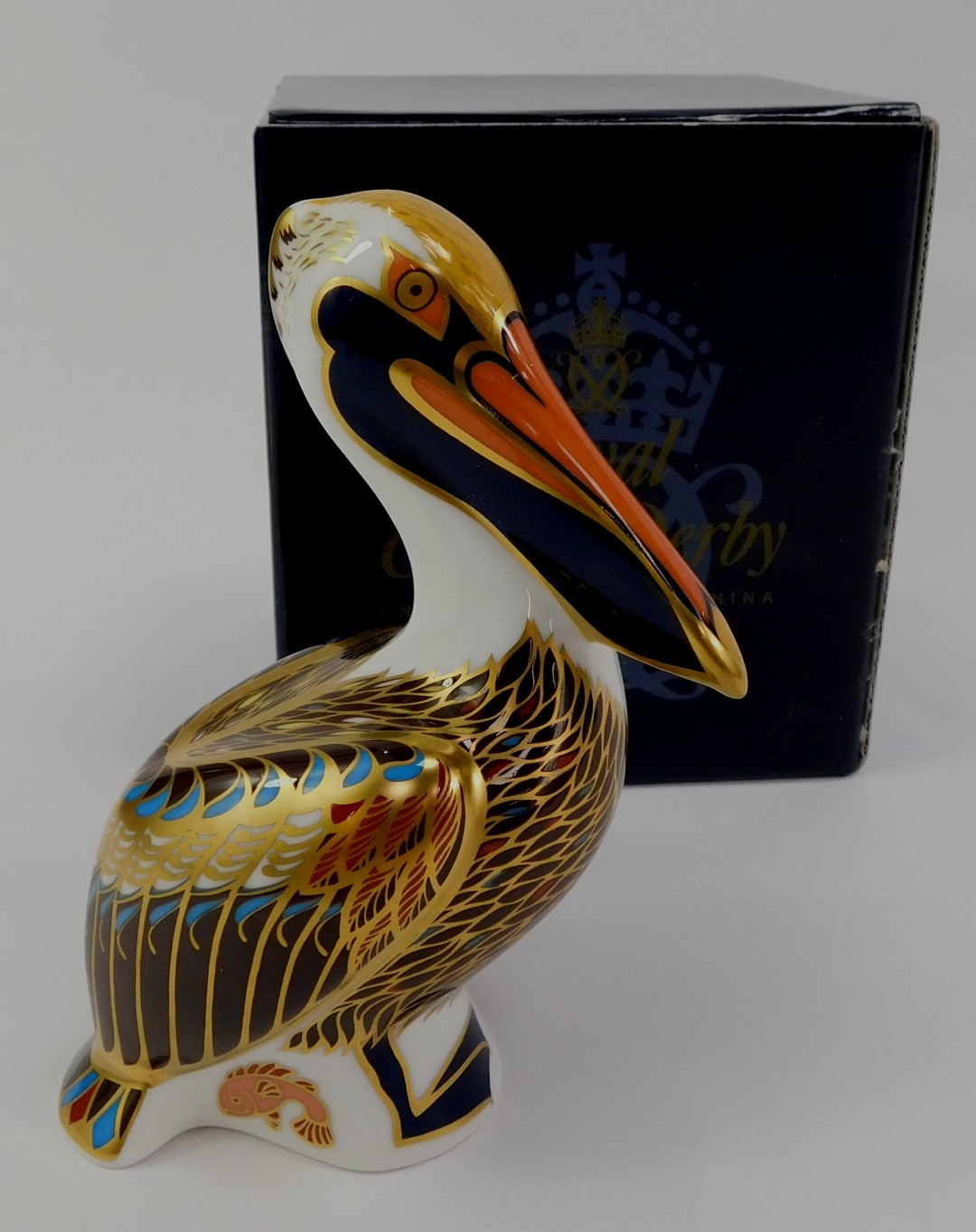 A Royal Crown Derby porcelain brown pelican paperweight, red printed marks and gold stopper, 14cm - Image 2 of 3