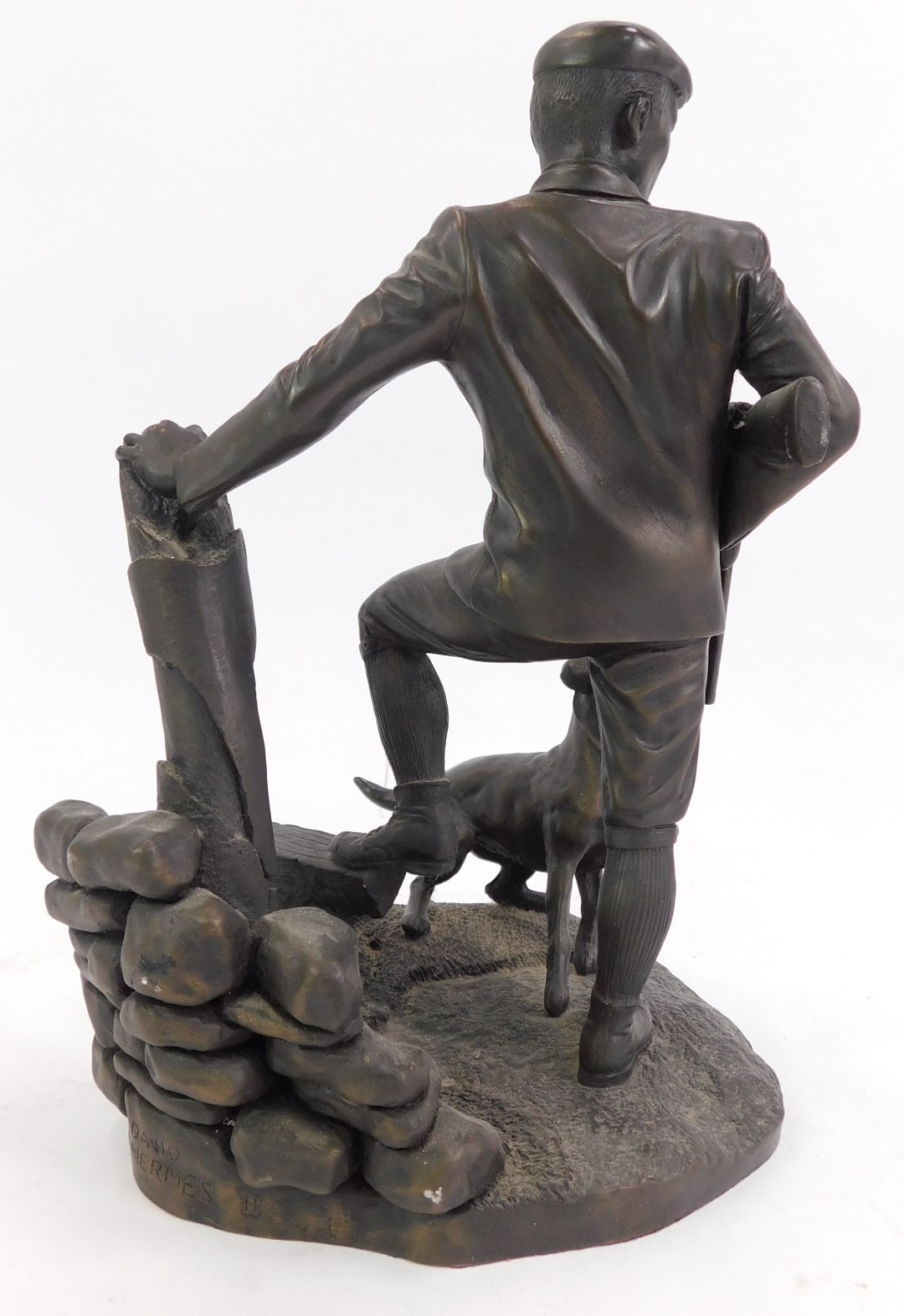 A 20thC resin figure group, depicting a gentleman in shooting attire, with cocked gun beside dog, - Image 2 of 3