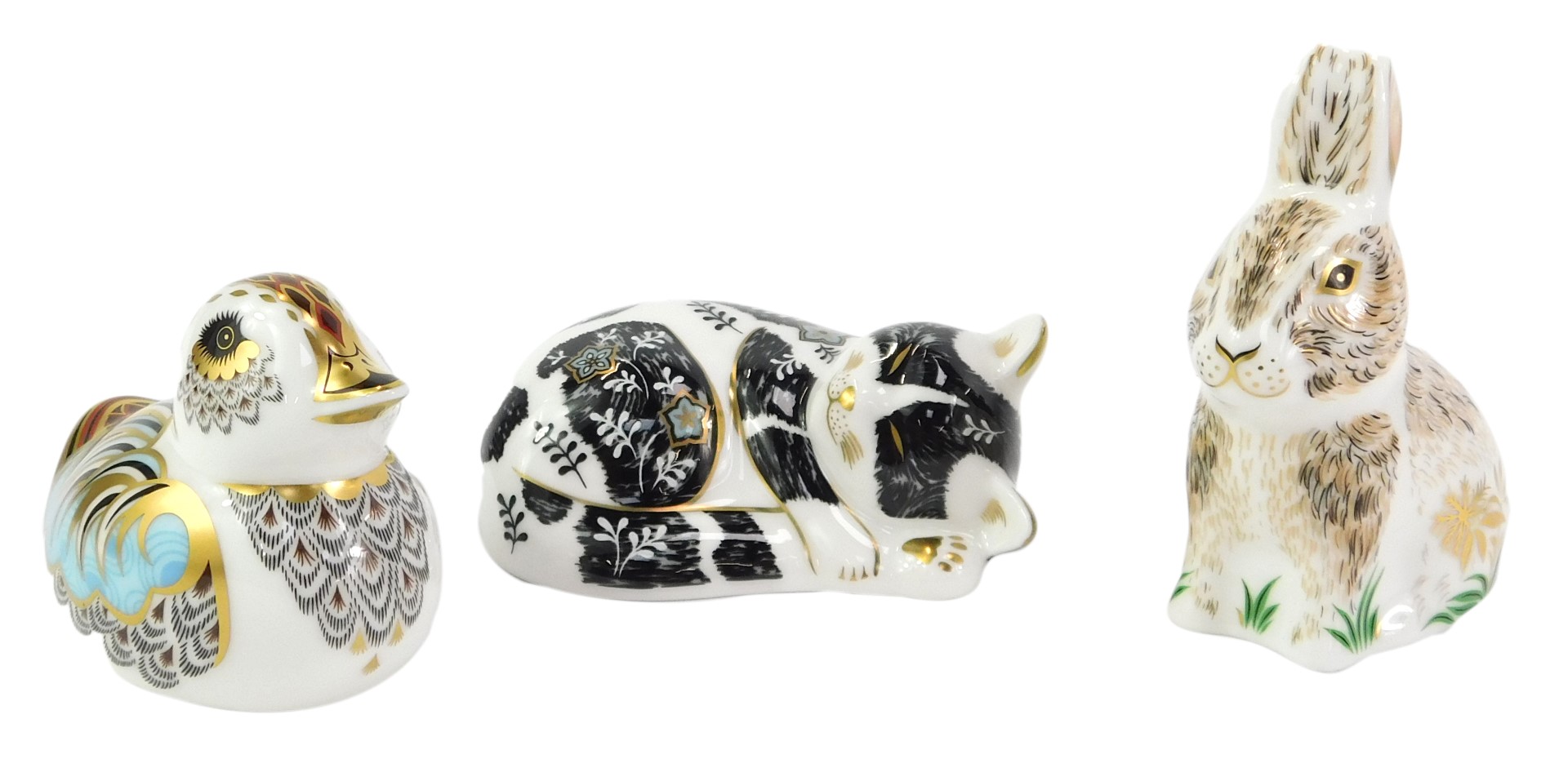 Three Royal Crown Derby porcelain paperweights, comprising Nibbles, Misty and Collectors Guild