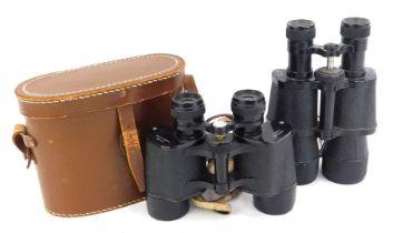 A pair of Lieberman and Gortz 12x40 binoculars, in leather case, together with a PM Optic pair of