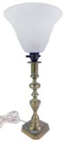 A brass table lamp, with frosted glass shade, of trumpet form, 39cm high.