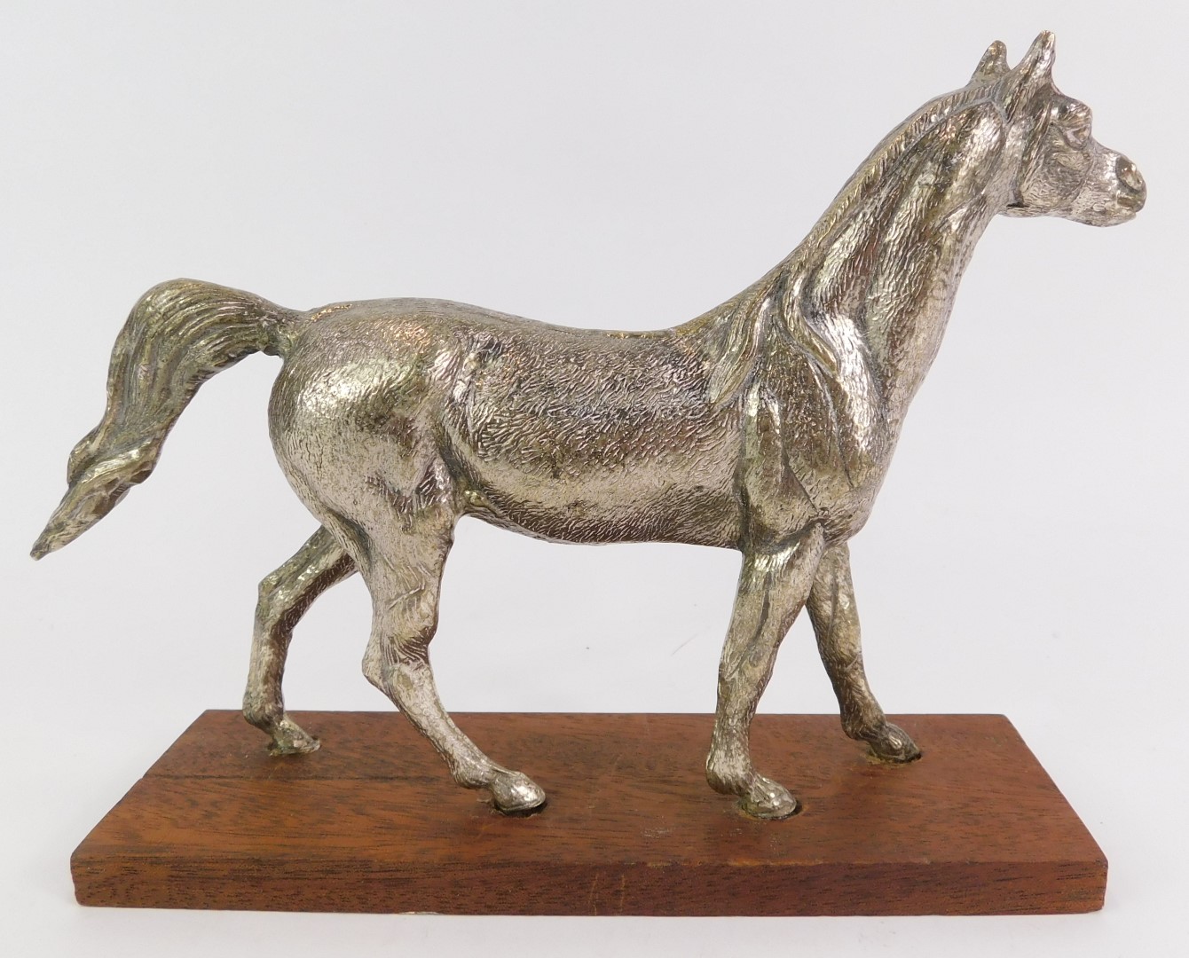 A 20thC model of a galloping horse, with silvered finish, on wooden rectangular base, with two - Image 2 of 2