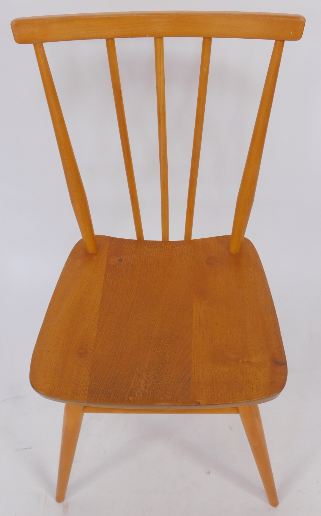 A set of four Ercol elm and beech dining chairs, model number 391, some bearing labels and each - Image 2 of 3