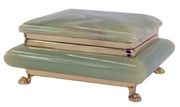 A 1920s green onyx cigarette box, the rectangular hinged top opening to reveal a vacant interior