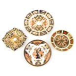 A group of Royal Crown Derby porcelain, each decorated in the Imari palette, comprising a plate,