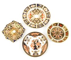 A group of Royal Crown Derby porcelain, each decorated in the Imari palette, comprising a plate,