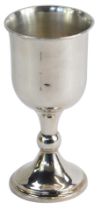 A Victorian silver goblet, with ribbed foot, on a stepped base, maker CB, London 1863, 7cm high, 5.
