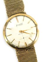 An Accurist 9ct gold cased gent's wristwatch, with a circular silvered dial, gold outer batons,