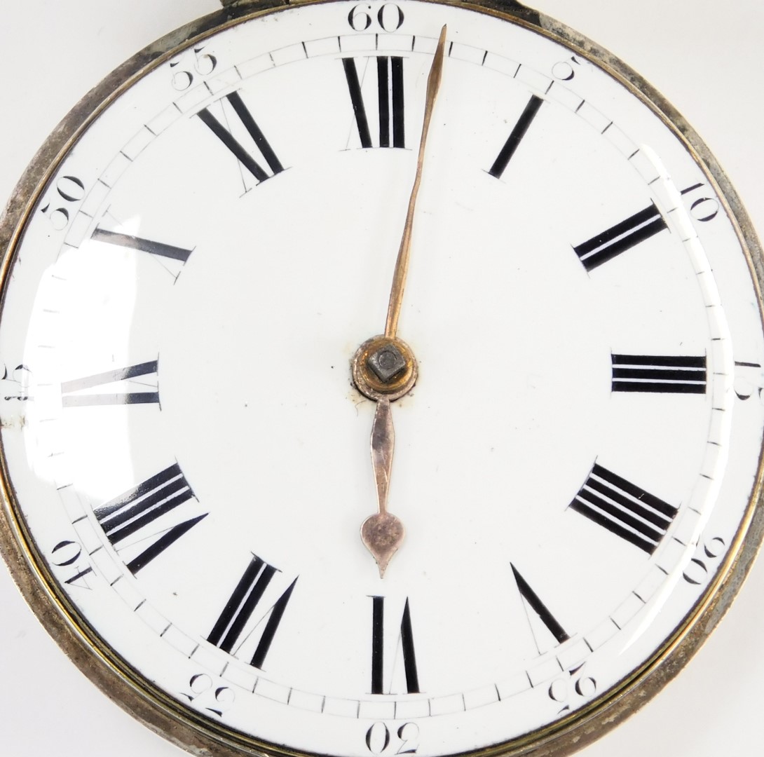 A George III silver pair cased pocket watch, with a white enamel Roman numeric dial and key wind, - Image 2 of 5