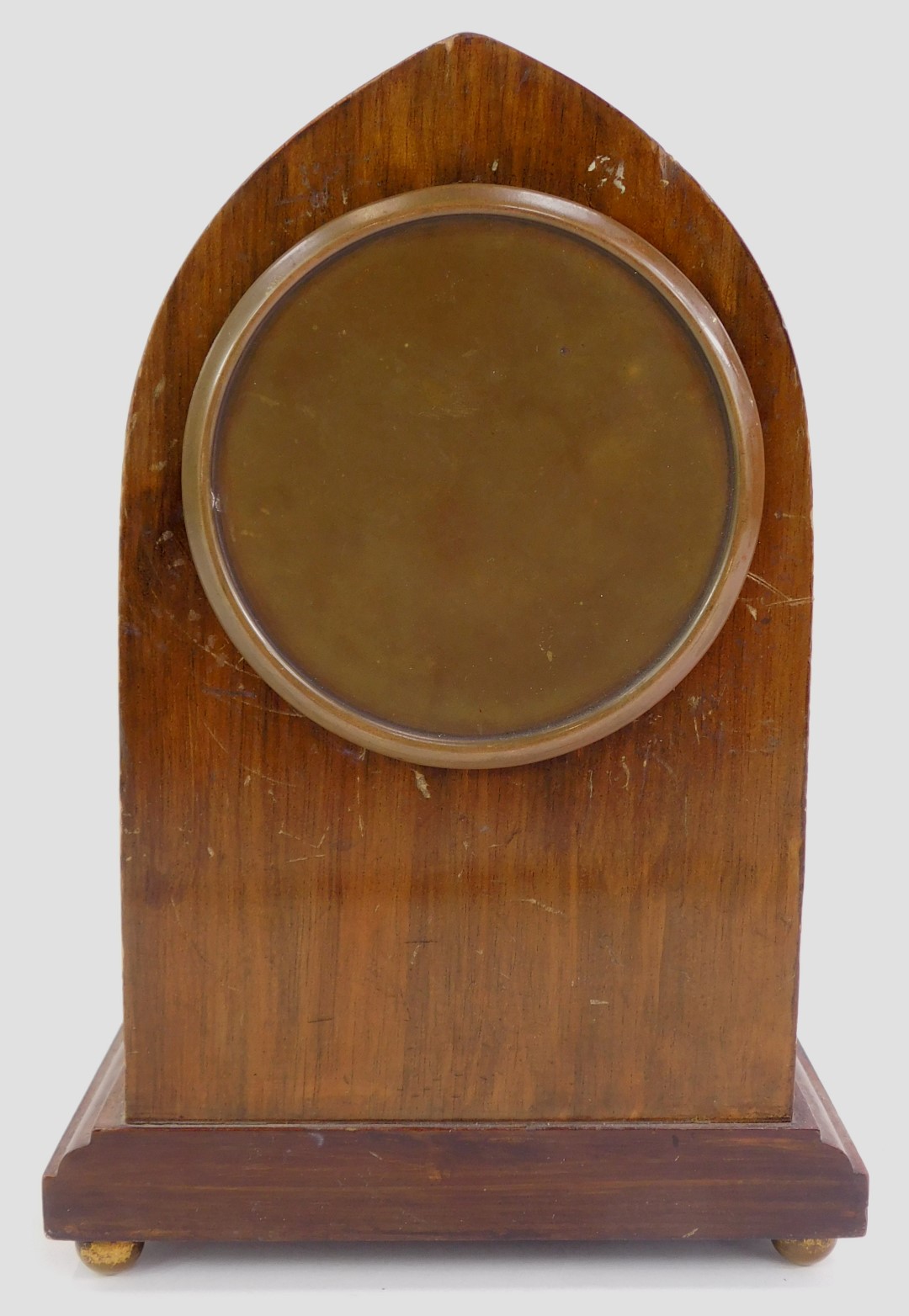 An early 20thC mahogany mantel clock, the circular white enamel dial bearing Roman numerals, key - Image 2 of 3