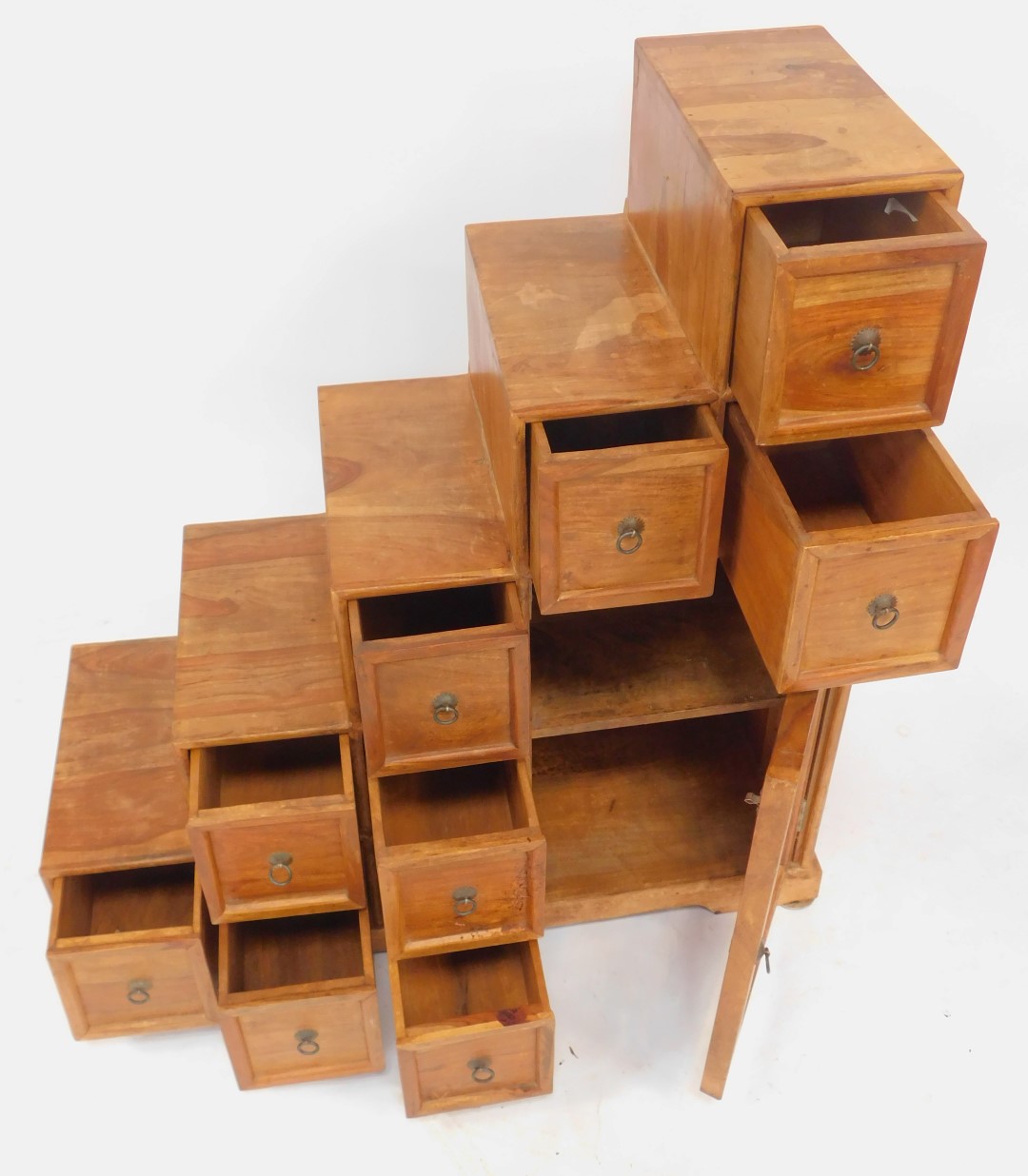 An Eastern mango wood cabinet, of stepped design, with an arrangement of nine drawers, with an - Image 4 of 4