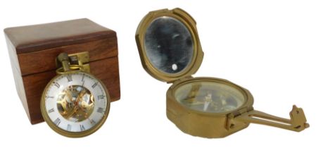 A brass cased compass, the underside to the hinged lid inset with a mirror, 8cm wide, the dial