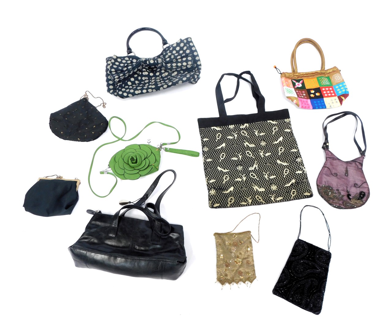 A group of handbags, to include a Lulu Guinness top handle bag, in navy blue and cream pots,