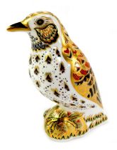 A Royal Crown Derby porcelain song thrush paperweight, red printed marks and gold stopper, 11cm