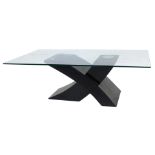 A modern coffee table, the glass rectangular top raised on an ebonised base of abstract X shaped