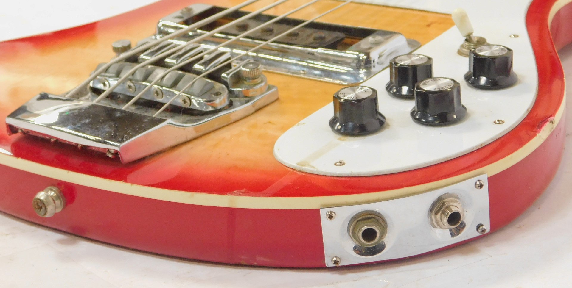 A Rirkenbacker electric bass guitar, the body in red, with the front panel fading to a yellow, the - Image 6 of 7