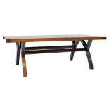 A modern bespoke walnut coffee table, rectangular top raised on arched support united by stretchers,