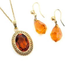 A collection of jewellery, comprising a pair of paste stone set orange drop earrings, each on plated