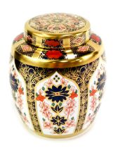 A Royal Crown Derby porcelain jar and cover, decorated in the Old Imari pattern, 1128, red printed