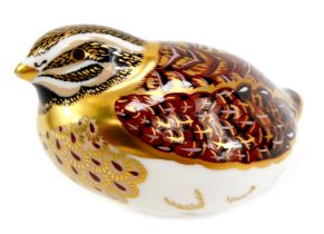 A Royal Crown Derby porcelain dappled quail paperweight, red printed marks and gold stopper, 6.5cm