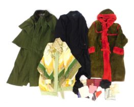 Various coats, to include a green suede coat with red trim and red faux fur hood and lining, a