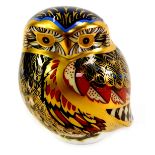 A Royal Crown Derby porcelain little owl paperweight, red printed marks and gold stopper, 8cm