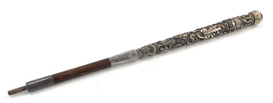 A Chinese white metal parasol handle, with raised and moulded dragon and Chinese writing handle,