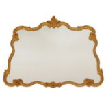 A rococo style gilt framed wall mirror, of shaped rectangular form, 70cm x 80cm.