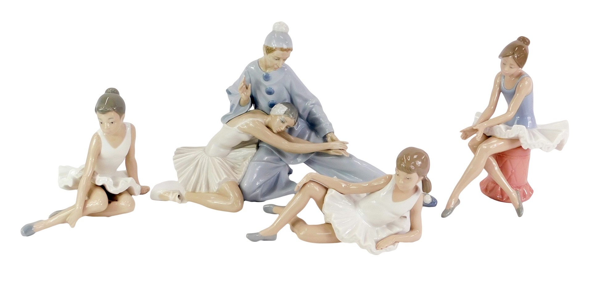 Three Nao porcelain figures, modelled as ballerinas, in differing poses, each boxed, together with a