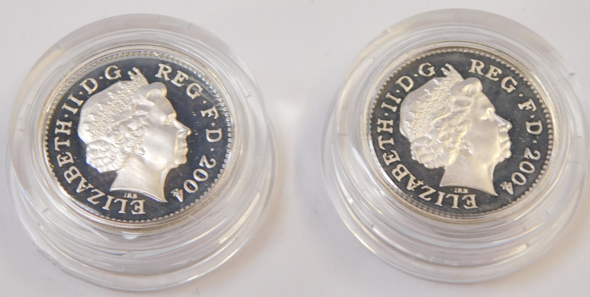 Two Royal Mint silver proof one pound coins, for 2004, with certificate of authenticity, boxed. (2) - Image 3 of 3