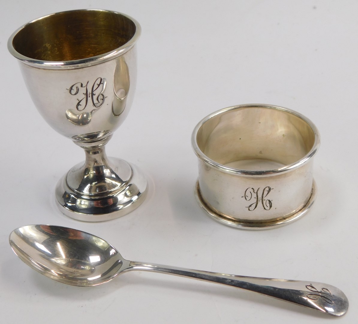 A George VI cased silver Christening set, comprising egg, spoon and napkin rings, each bearing the - Image 2 of 3