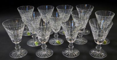 A set of twelve Waterford crystal Tramore pattern claret glasses, each 12.5cm high, some bearing