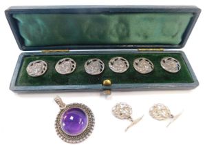 A set of six cased Art Nouveau buttons, each depicting female in pierced border, white metal
