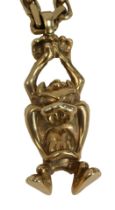 A 9ct gold Tasmanian devil pendant and chain, the taz bearing maker BBD, Sheffield 1958, 7.5cm high,