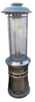A Lifestyle gas fired patio heater, 183cm high.