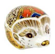 A Royal Crown Derby porcelain Hawthorne paperweight, red printed marks and gold stopper, 5cm high,
