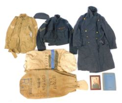 A World War II RAF kit bag, for Arthur Norman Cotton, containing blue wool overcoat, blue wool