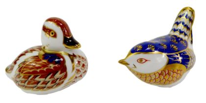 Two Royal Crown Derby porcelain bird paperweights, comprising duckling, red printed marks and gold