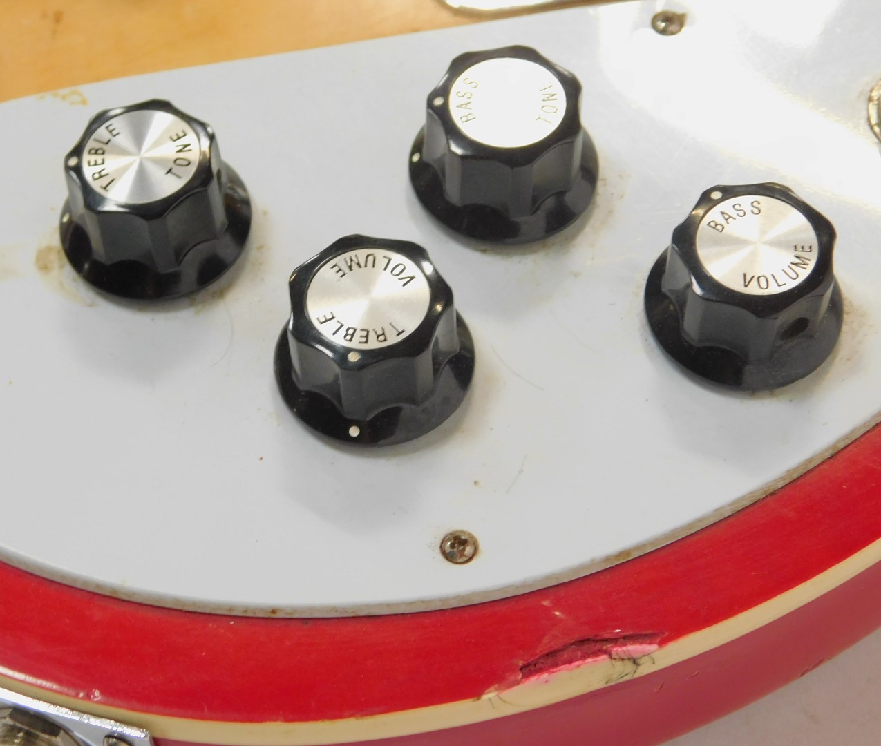 A Rirkenbacker electric bass guitar, the body in red, with the front panel fading to a yellow, the - Image 7 of 7