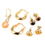 Various earrings, comprising a pair of 9ct gold hoop earrings, 1.2g, a pair of 9ct gold garnet