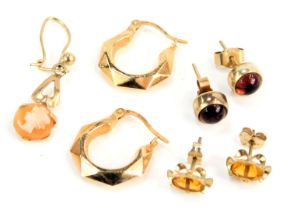 Various earrings, comprising a pair of 9ct gold hoop earrings, 1.2g, a pair of 9ct gold garnet