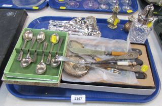 Silver plated wares, comprising cased teaspoon, various shell pattern A1 cutlery, sugar shaker,